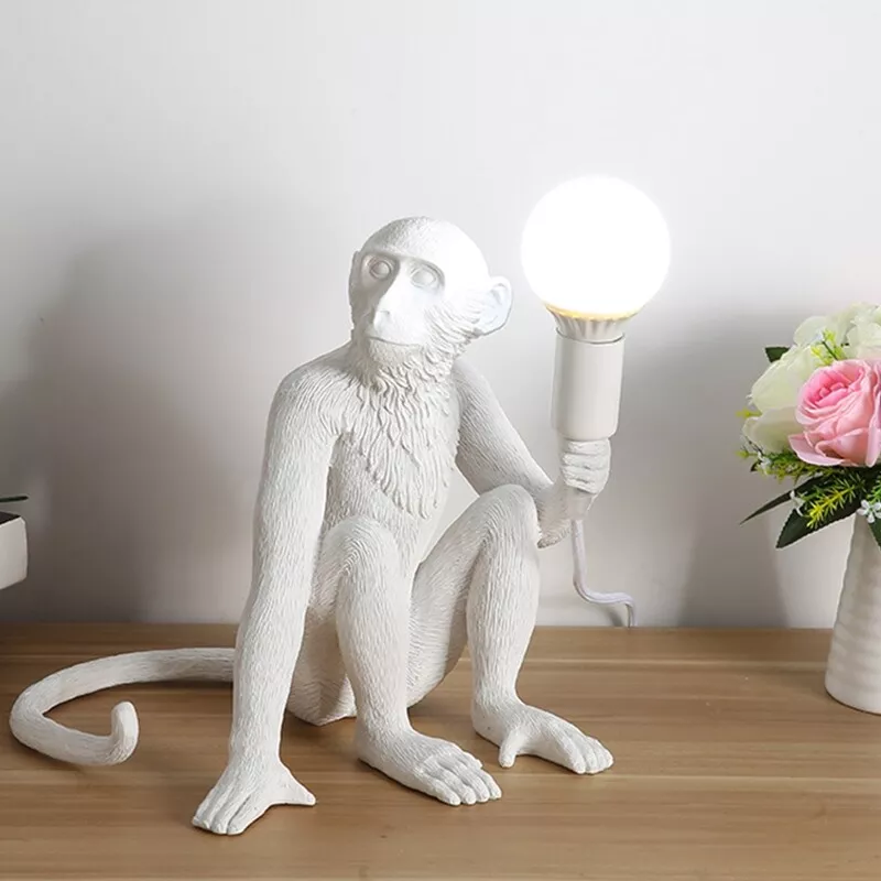 Monkey holding light deals