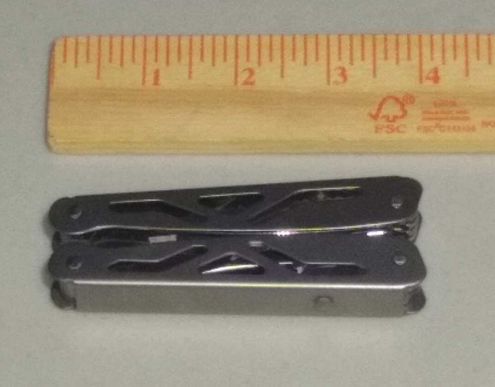 Compact Multi-Tool with Needle Nose Pliers, 2 Blades, and File Compact Multi-Tool with Needle Nose Pliers, 2 Blades, and File