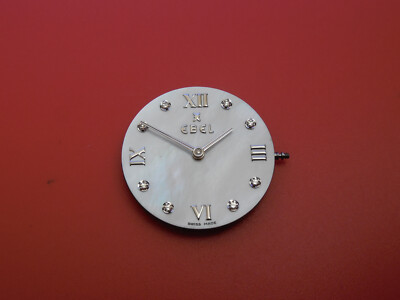 100% EBEL 157 FOUR JEWEL QUARTZ MOVEMENT WITH DIAMOND MOP DIAL AND HANDS