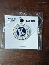 Kiwanis International Lapel Pin Lending A Hand