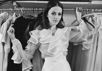 Fashion model Annie Fielding wearing a ruffled see through blouse - Old Photo