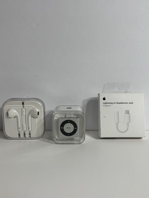 Apple iPod shuffle 4th Gen Silver (2 GB) w/ Earpods,Charger And Adapter Bundle.