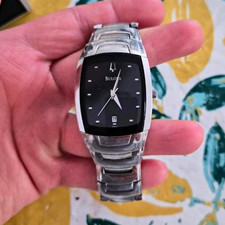 Bulova Armbanduhr Edelstahl silber schwarz analog Datumsanzeige Box rechteck
