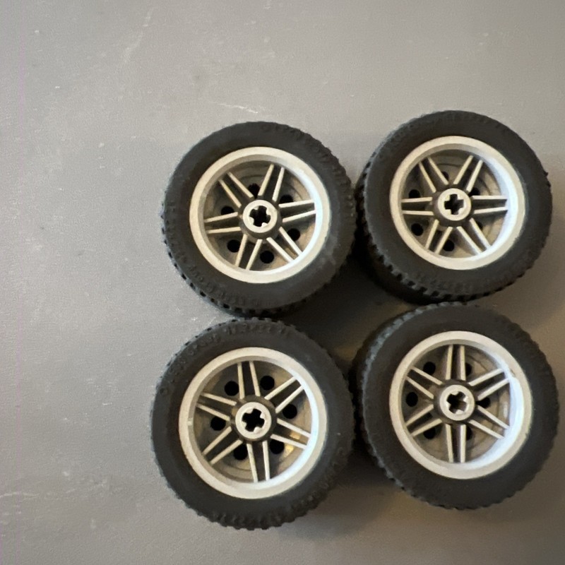 These are LEGO Technic wheels and tires, identified as part number 56145