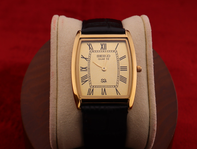 Vintage Men Seiko quartz Barrel-Tank Golden Dial ,Black leather