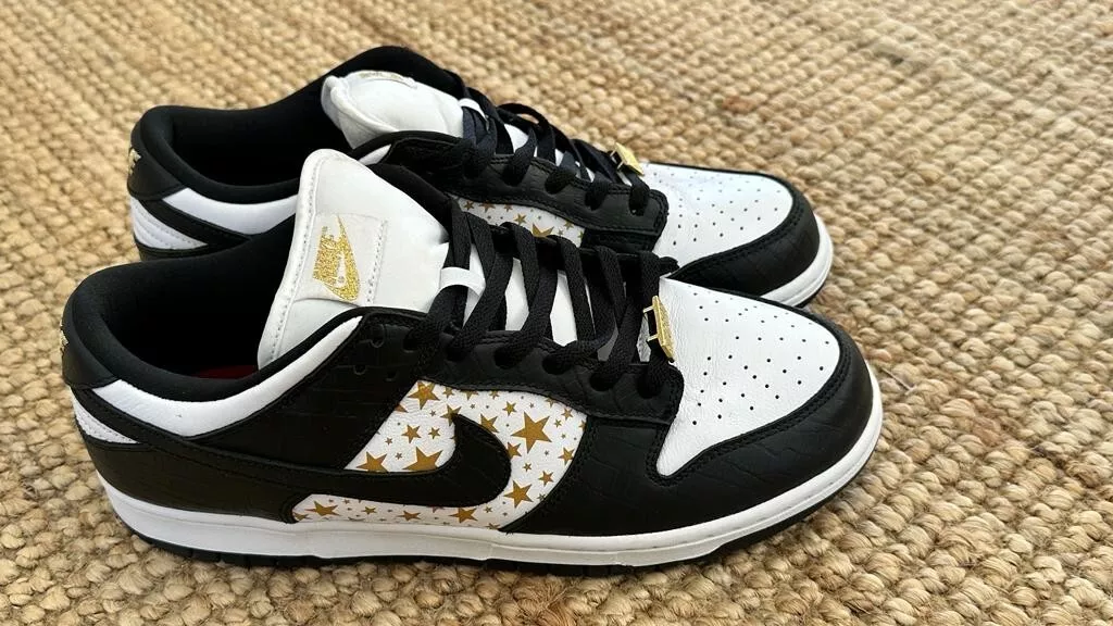 Supreme × Nike SB Dunk Low OG Gold Stars