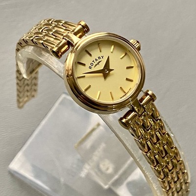 Damen-Cocktailuhr echt rotierend goldfarbenes champagnerfarbenes Zifferblatt neu aus altem Lagerbestand gewartet