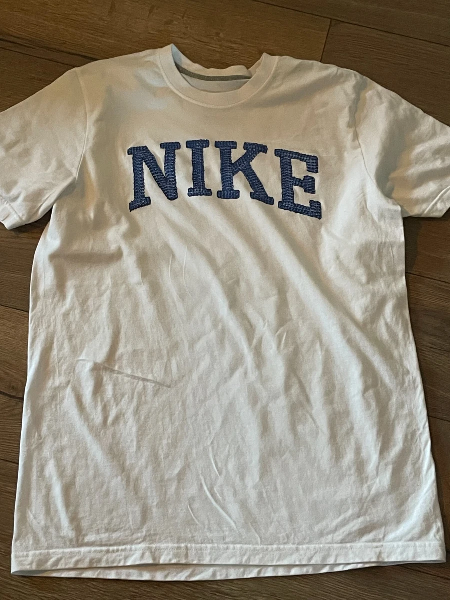 Blue and white on sale nike shirt