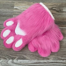 The animal's fluffy pink paws were made by hand.