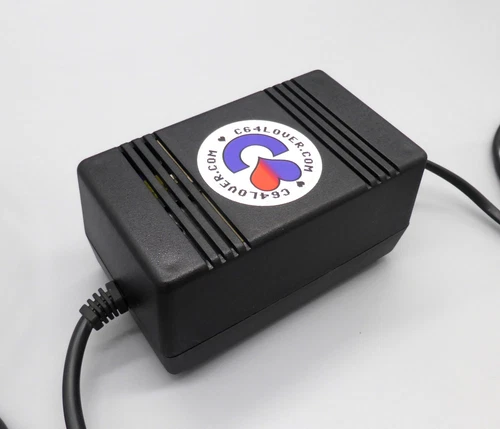 Netzteil für Commodore 64 schwarz .NEU. Power supply for Commodore 64 black. NEW