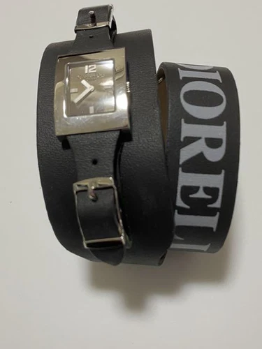Montre femme Dior Maris Occasion, a besoin d'une pile, rayures présentes
