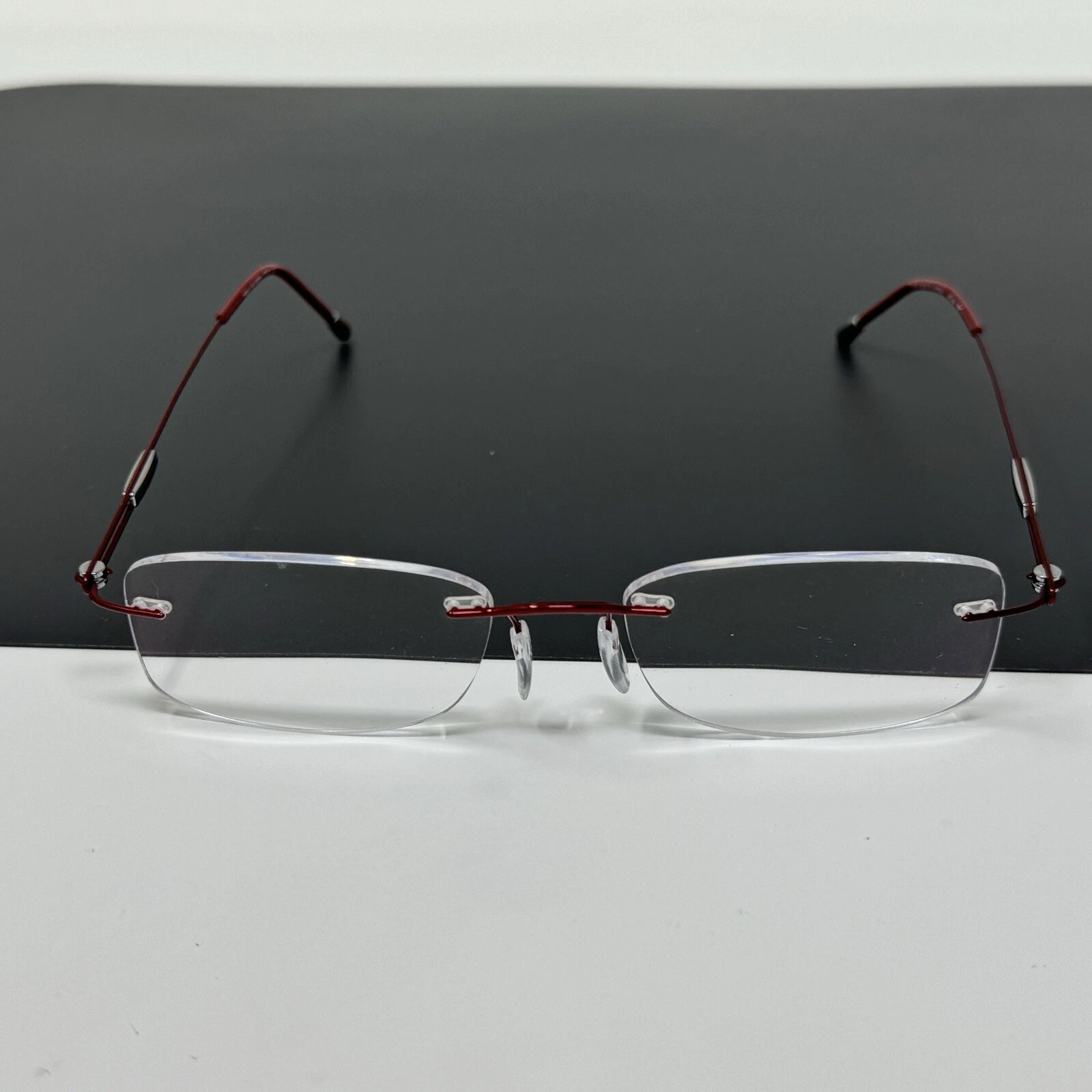 Silhouette 7534 40 6079 Titanium Red Rimless Eyeglasses Frames 17 135 Austria