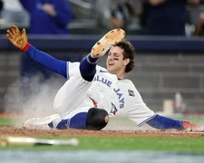 Ernie Clement Toronto Blue Jays UNSIGNED 8x10 Photo World Series Slide