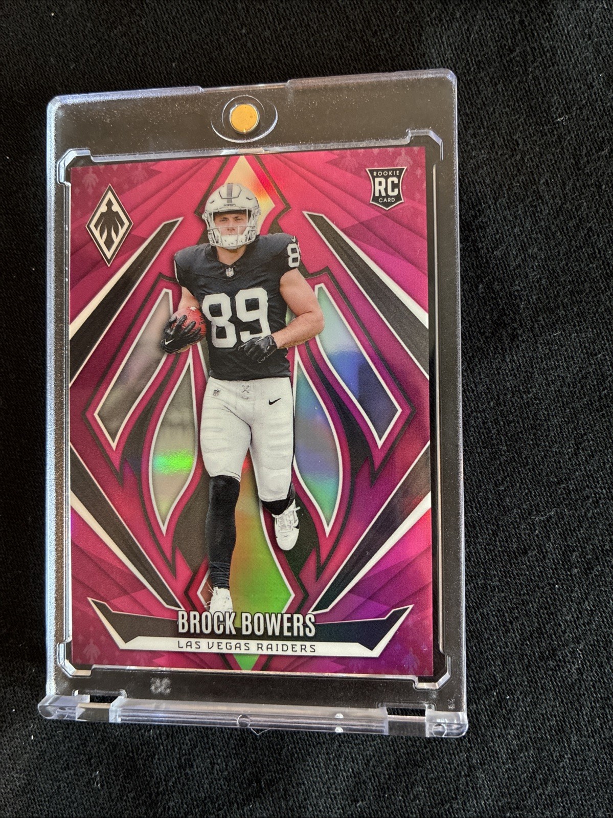 2024 Panini Phoenix - Rookies Brock Bowers #165 Pink /40 (RC)