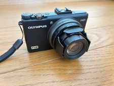 Olympus XZ 1 with Automatic Lens Cap