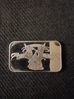 APMEX 1 troy ounce .999 fine silver bar featuring an eagle design.
