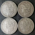 1882, 1896 O, 1900 O, and 1901 O $1 Morgan Silver Dollars