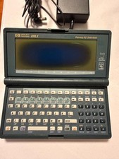 HP 200LX Palmtop PC 2MB RAM DOS Handheld  AC Adapter Case Manuals Catalog AS-IS