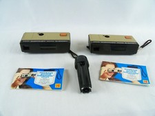 2 Kodak Hawkeye Pocket Instamatic Cameras With Manuals And Light Cube Riser