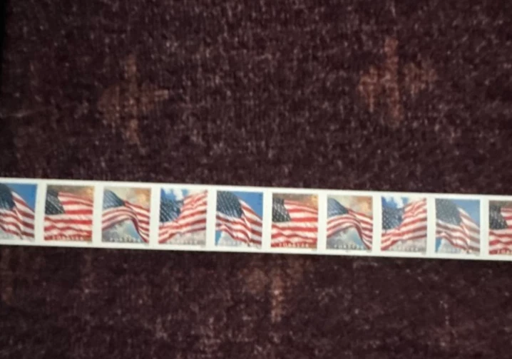 USPS roll of 100 FOREVER FLAG STAMPS bundle