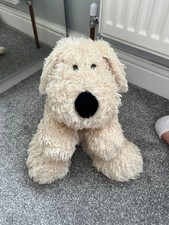 Cream fluffy soft dog cuddly toy