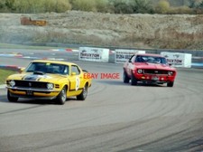 PHOTO  MARTIN ELDRIDGE'S FORD MUSTANG AND NICK SAVAGE'S CHEVROLET CAMARO SS WERE