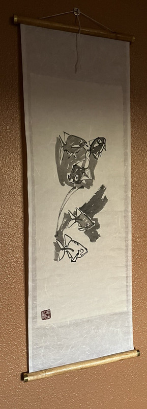Beautiful Rice Paper art work on a scroll format the pattern is of fish