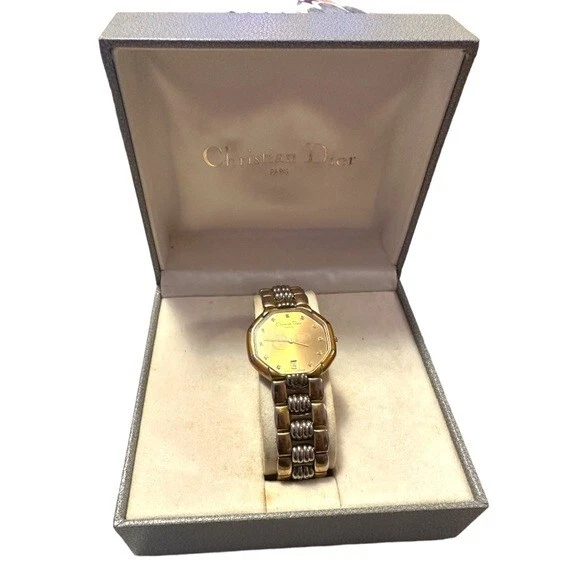 Montre femme Christian Dior quartz date plaqué or, cadran blanc vintage