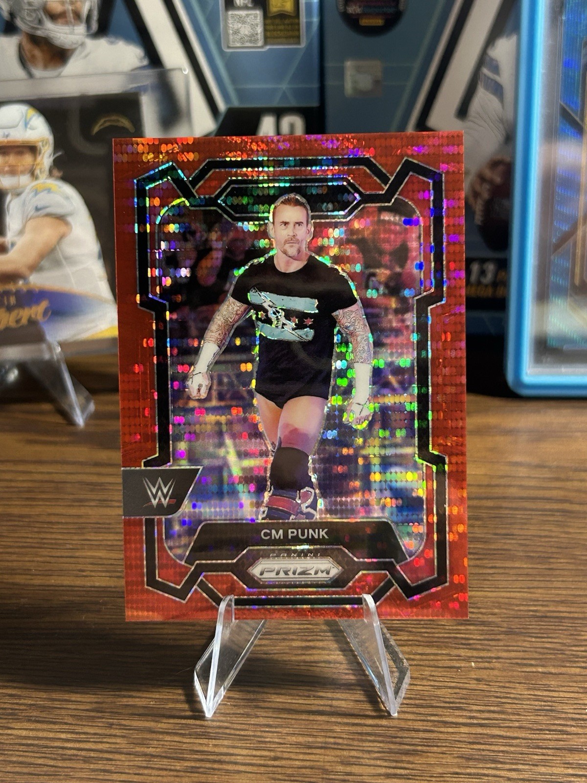 Panini Prizm WWE 2024 CM Punk #122 Red Pulsar Prizm /399