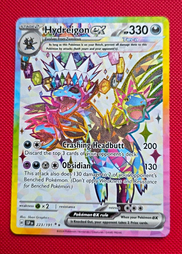 The Pokémon Company Hydreigon ex 223/191 Sv08: Surging Sparks UR Holo FA EN
