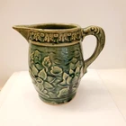 McCoy Green Stoneware Pitcher Water Lily With Fish Handle 1930's 5.5 Inches Tall