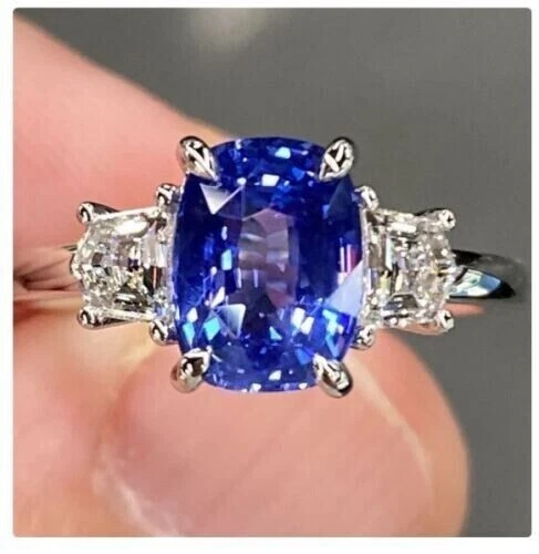 Anillo de compromiso de boda de tres piedras de tanzanita de corte ovalado de 3 quilates de plata de ley 925. Foto 2 de 4