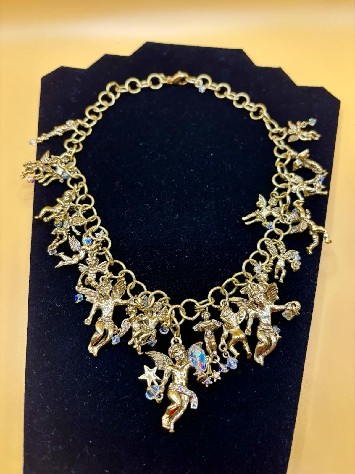 RARE Kirks Folly Retired Collector 21 Charm Angelic Host Statement Necklace
Opens in a new window or