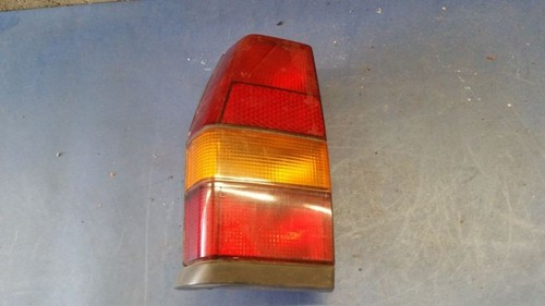 VW POLO (86C, 80) Rücklicht Rückleuchte links mit Lampenträger 867945111A