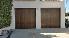 Caprice Design - [16' x 7'] Spanish Style Custom Mahogany Wood Garage Door