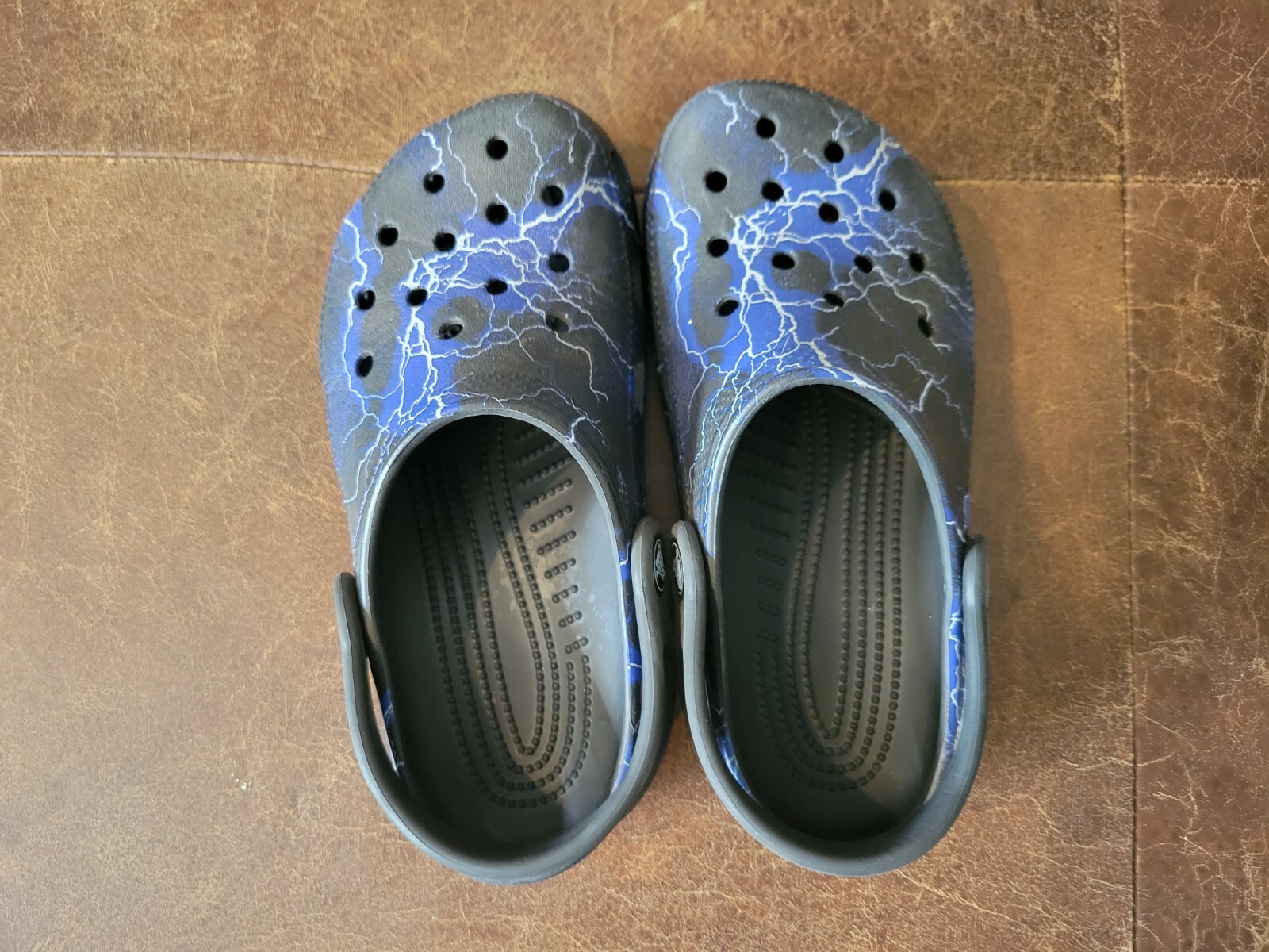 black and blue lightning crocs
