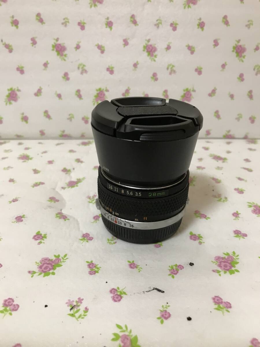 OM-G ZUIKO 28mm f3.5 Lens with Hood Used, Slight Dust, Normal