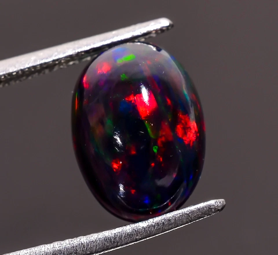 Piedra preciosa suelta cabujón forma ovalada ópalo etíope negro natural 2,5 quilates 11x8x5 mm Foto 2 de 3