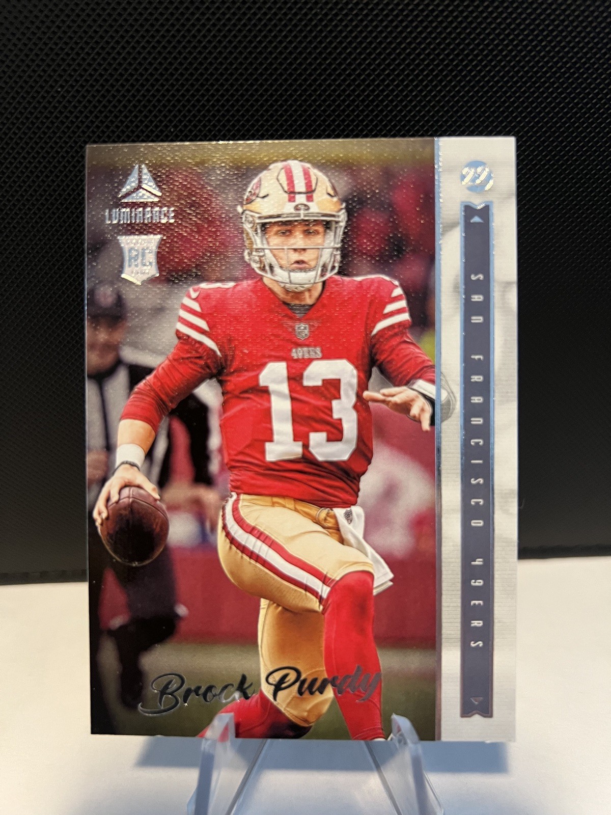 2022 Panini Chronicles - Luminance Update Rookies Brock Purdy #213 (RC)
