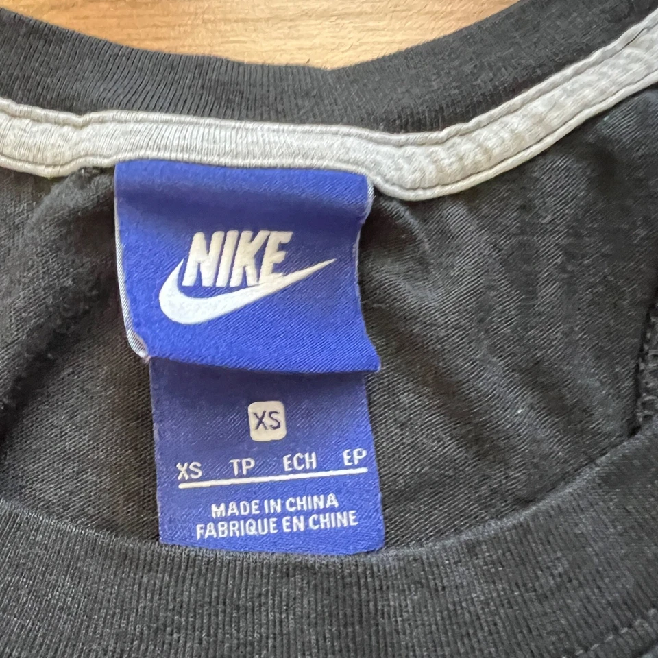 Camiseta sin mangas Nike para mujer talla XS negra/gris Just Do It Foto 3 de 4