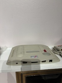 Amstrad GX4000 Console with Burning Rubber Game and Controller