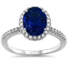 Halo Oval Blue Sapphire  Cubic Zirconia Halo .925 Sterling Silver Ring