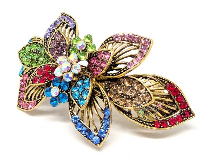 Pasador de pelo de mujer arco iris color pedrería metal flor garras de pelo clips Foto 2 de 3