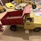 Tonka Pressed Steel Dump Truck Construction Vehicle Toy, Yellow & Red