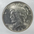 1928 Peace Silver Dollar 1.00. NGC AU58.