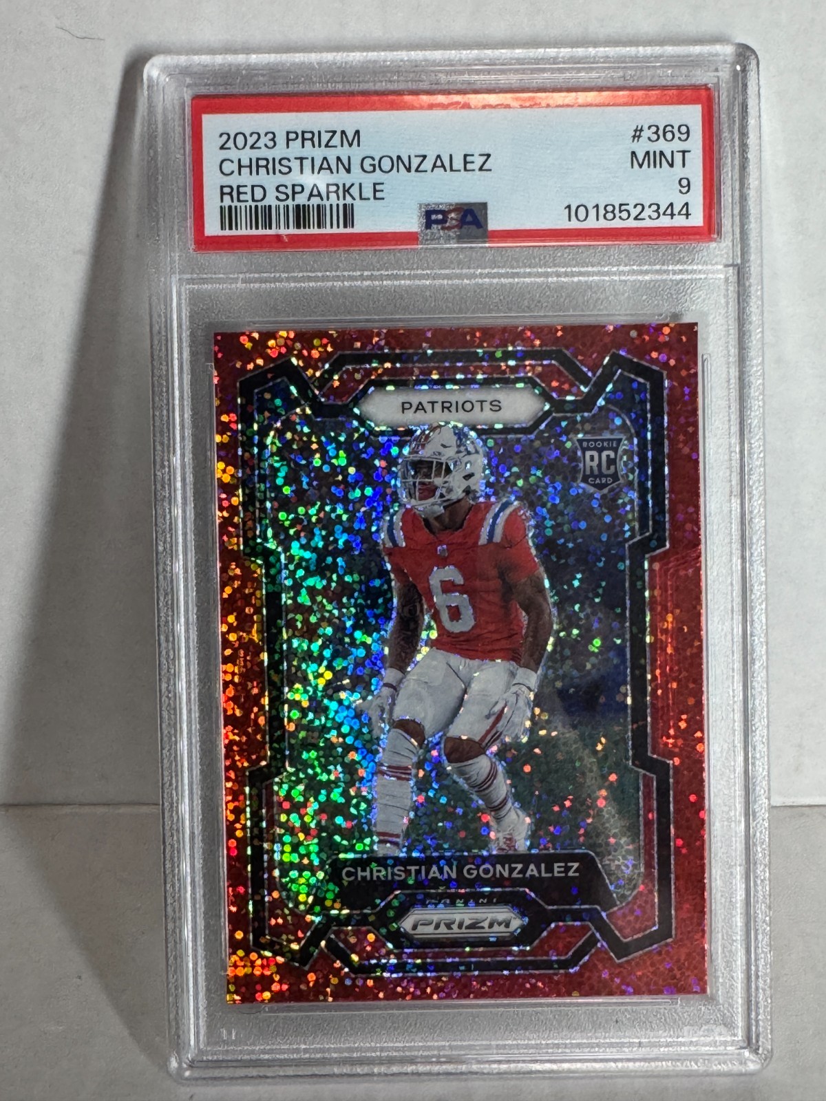 2023 Panini Prizm - Rookies Christian Gonzalez #369 Red Sparkle Prizm (RC) psa 9