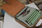 HERMES BABY TYPEWRITER COMPLETE WITH ORIGINAL CASE AND INSTRUCTIONS