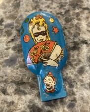 Masked Girl  Clown - U.S Metal Toy Co., Vintage Tin Clicker/Noisemaker 4.25"