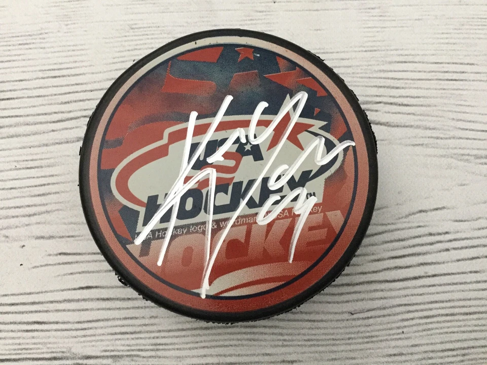 Disco de hockey firmado por Keith Yandle equipo de EE. UU. CERTIFICADO DE AUTENTICIDAD PSA/DNA b Foto 3 de 3