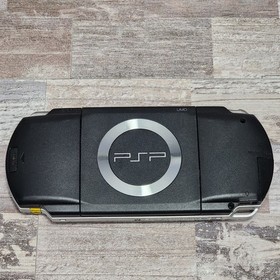 Sony PSP-1001 Console with Battery, Charger and 3 Games Bundle - USA